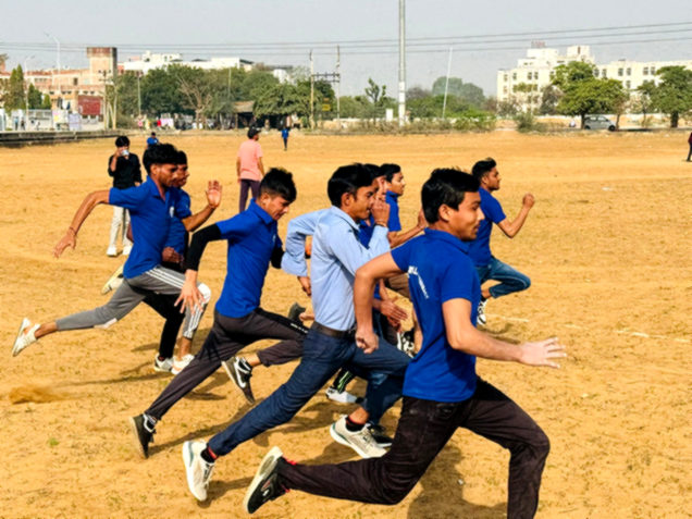 Students playing volleyball at Jaipur College of Pharmacy