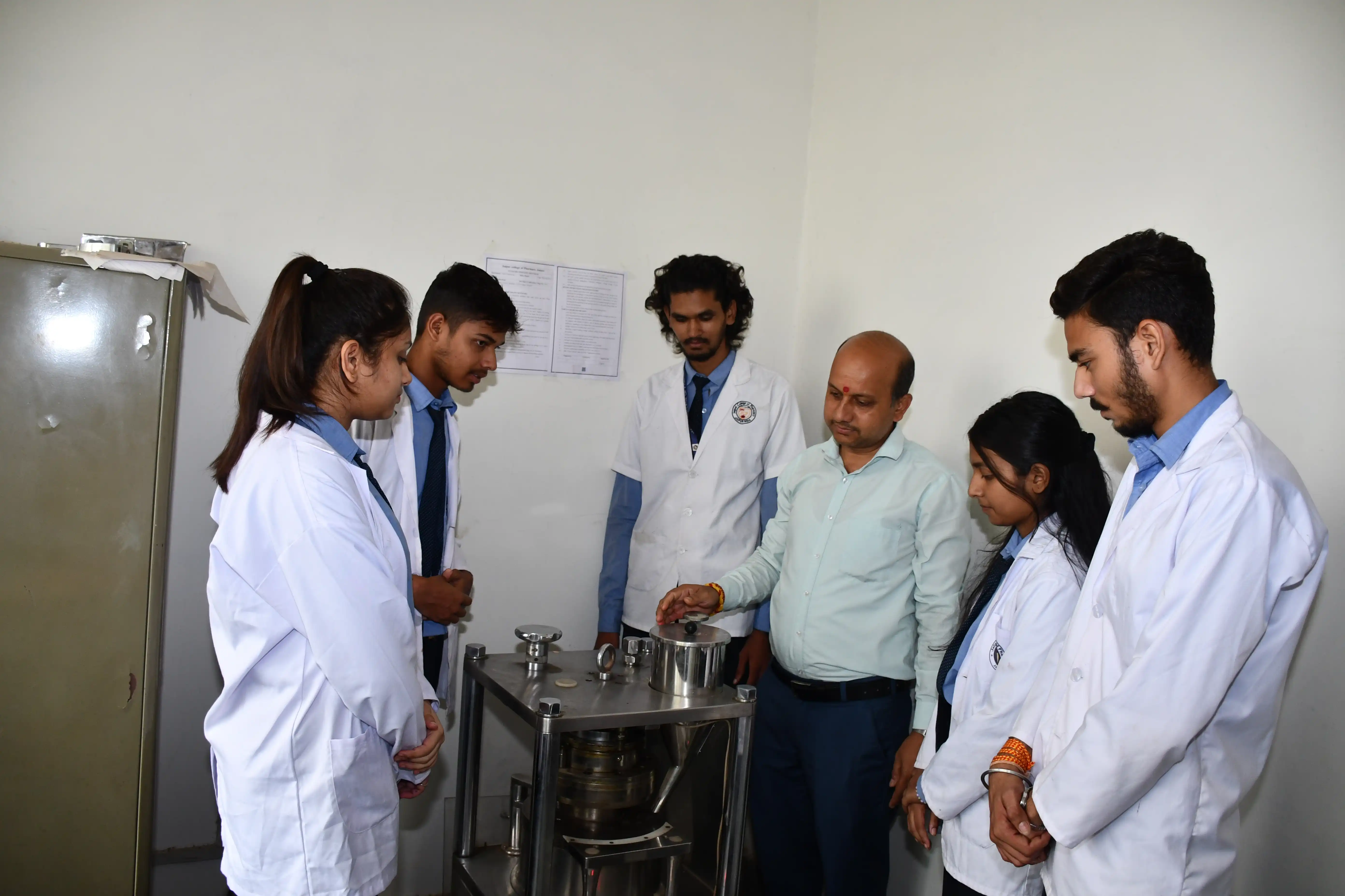 Students in a pharmaceutics laboratory session